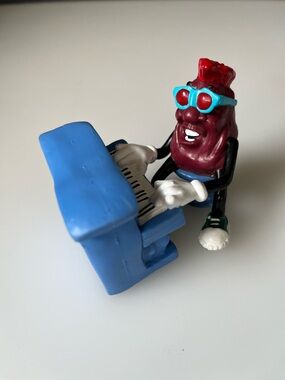 California Raisin Piano Man Ray “Red” Charles